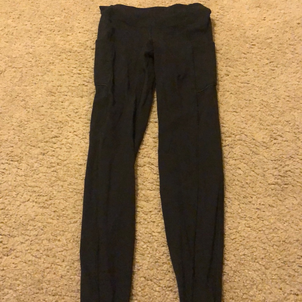 Lululemon black mid-waist leggings size 4